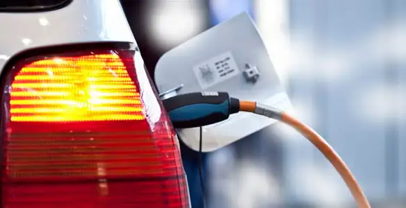 Electric car plugged into EV charger after professional installation in San Jose, CA