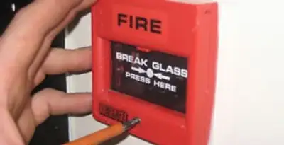 fire alarm installation service showing manual fire alarm pull station installed by licensed electricians in San Jose, CA