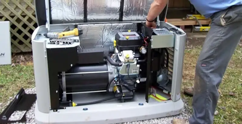 generator installation service showing technician connecting and configuring generator components in San Jose, CA