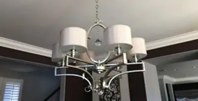 Modern chandelier installation with multiple light fixtures in San Jose, CA