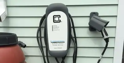 Outdoor electric vehicle charger installation on residential wall in San Jose, CA