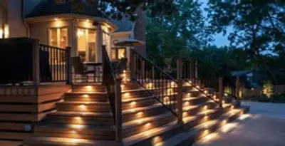 Residential electrician installing outdoor lighting for home safety in San Jose, CA
