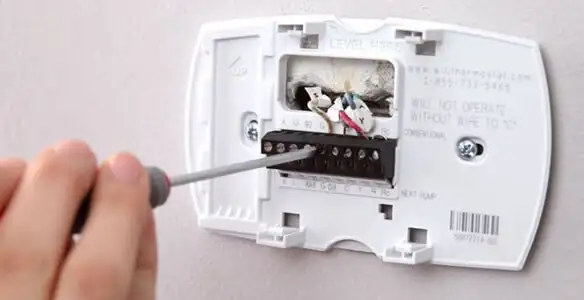 Thermostat installation service with proper wiring and secure wall mounting in San Jose, CA