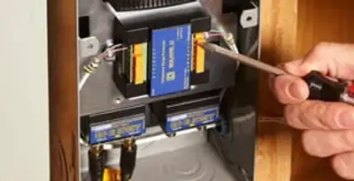 Whole home surge protection device being installed by a licensed electrician to protect electrical systems in San Jose, CA